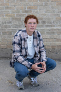 Littleton high school senior photographer Golden Colorado Clear Creek river park photography sunset foothills ginger basketball boy teenager urban city