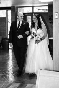 Littleton wedding photographer church bride and groom Colorado photography Lutheran ceremony dress vows marriage married reception cake father aisle