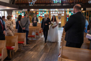 Littleton wedding photographer church bride and groom Colorado photography Lutheran ceremony dress vows marriage married reception cake