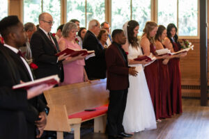 Littleton wedding photographer church bride and groom Colorado photography Lutheran ceremony dress vows marriage married reception cake