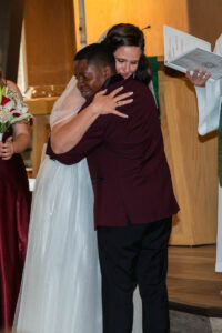 Littleton wedding photographer church bride and groom Colorado photography Lutheran ceremony dress vows marriage married reception cake