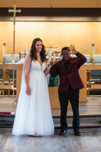 Littleton wedding photographer church bride and groom Colorado photography Lutheran ceremony dress vows marriage married reception cake