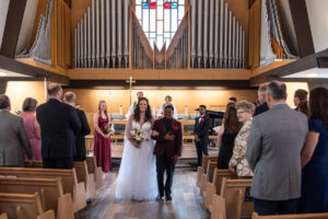 Littleton wedding photographer church bride and groom Colorado photography Lutheran ceremony dress vows marriage married reception cake