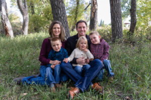Littleton family photographer McCabe Meadows Colorado sunset photography twins kids mother father son daughter river bridge siblings