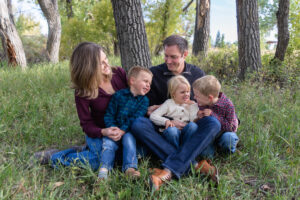Littleton family photographer McCabe Meadows Colorado sunset photography twins kids mother father son daughter river bridge