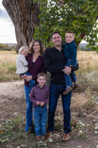 Littleton family photographer McCabe Meadows Colorado sunset photography twins kids mother father son daughter river bridge