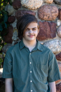 Littleton family photographer Highlands Ranch Mansion photographer Colorado stone wall teen boy brother