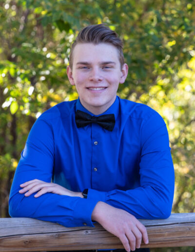 Littleton high school senior photographer Colorado School of Mines photography Golden Clear Creek river water teenage boy bow tie theater