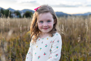 Littleton family photographer mini photo session Colorado foothills sunset sisters mother father daughters fall photography