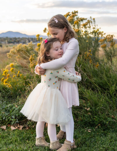 Littleton family photographer mini photo session Colorado foothills sunset sisters mother father daughters fall photography