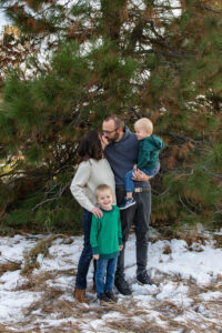 Littleton family photographer mini photo session fall Colorado snow baby boys brothers mother father sons sunset photography foothills