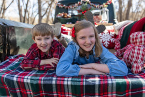 Littleton family photographer mini holiday photo session Santa Claus vintage truck Christmas Chatfield State park Colorado photography