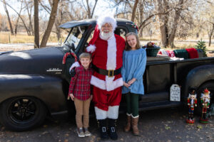 Littleton family photographer mini holiday photo session Santa Claus vintage truck Christmas Chatfield State park Colorado photography