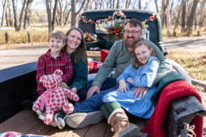 Littleton family photographer mini holiday photo session Santa Claus vintage truck Christmas Chatfield State park Colorado photography