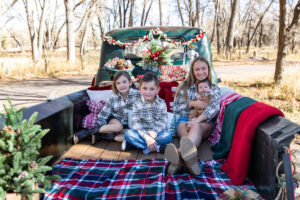 Littleton family photographer mini holiday photo session Santa Claus vintage truck Christmas Chatfield State park Colorado photography