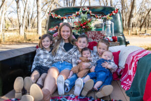 Littleton family photographer mini holiday photo session Santa Claus vintage truck Christmas Chatfield State park Colorado photography