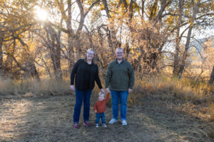 Littleton family photographer Hildebrand Ranch fall Colorado sunset photography baby boy mother father son foothills leaves