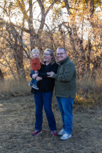 Littleton family photographer Hildebrand Ranch fall Colorado sunset photography baby boy mother father son foothills leaves