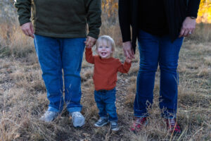 Littleton family photographer Hildebrand Ranch fall Colorado sunset photography baby boy mother father son foothills leaves