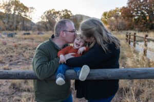 Littleton family photographer Hildebrand Ranch fall Colorado sunset photography baby boy mother father son foothills leaves