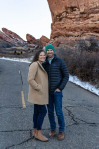 Littleton family photographer Red Rocks Amphitheatre Morrison Colorado snow Thanksgiving photography sunset foothills cold sister brother siblings mother father daughter son