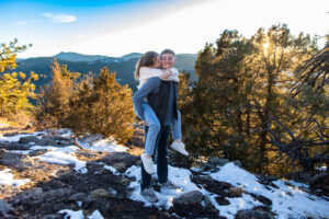 Littleton family photographer engagement session engaged marriage future bride groom Mt. Falcon park sunset photography Colorado in love mountain view
