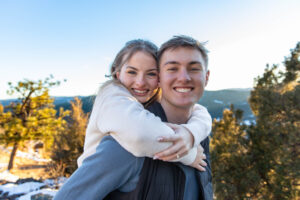 Littleton family photographer engagement session engaged marriage future bride groom Mt. Falcon park sunset photography Colorado in love