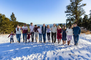 Littleton family photographer Colorado Mt. Falcon park mountain view extended cousins grandparents grandchildren snow siblings