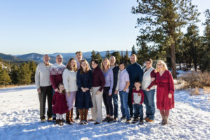 Littleton family photographer Colorado Mt. Falcon park mountain view extended cousins grandparents grandchildren snow siblings