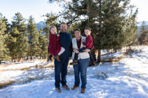 Littleton family photographer Colorado Mt. Falcon park mountain view extended cousins grandparents grandchildren snow siblings