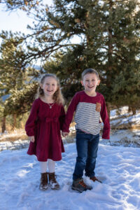Littleton family photographer Colorado Mt. Falcon park mountain view extended cousins grandparents grandchildren snow siblings