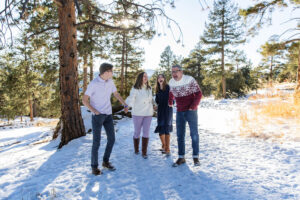 Littleton family photographer Colorado Mt. Falcon park mountain view extended cousins grandparents grandchildren snow siblings