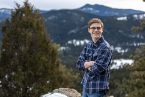 Littleton family photographer mountain view Colorado foothills siblings mother father daughter son brother sister sunset photography snow winter