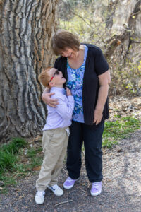 Littleton family photographer Writer's Vista park mother father son Colorado photography bridge lake foothills