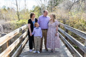 Littleton family photographer Writer's Vista park mother father son Colorado photography bridge lake foothills