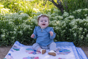 Littleton family photographer Standley Lake mother father daughter little girl baby dog park summer holiday photo session Colorado foothills photography