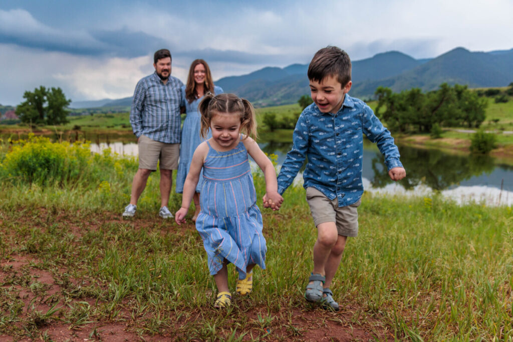 Littleton family photographer South Valley Open Space park in Colorado mother father daughter son siblings boy and girl photography red rocks