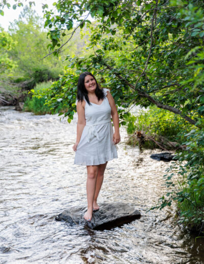Littleton high school senior photographer Colorado foothills teen teenager Chatfield karate photography Lair O' the Bear park family mother father daughter river water bridge