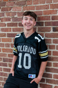 Littleton family and high school senior photographer Morrison Colorado photography CU buffs college bound church Platt Park boy Heritage teenager drums