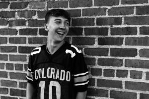 Littleton family and high school senior photographer Morrison Colorado photography CU buffs college bound church Platt Park boy Heritage teenager drums