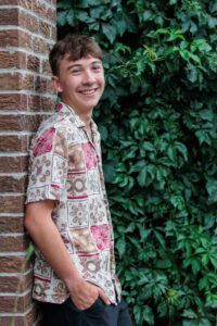 Littleton family and high school senior photographer Morrison Colorado photography CU buffs college bound church Platt Park boy Heritage teenager drums urban red rocks