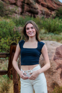 Littleton high school senior photographer Red Rocks Amphitheatre Morrison Colorado rain teenage girl photography Mountain Vista Highlands Ranch South Valley park rock formations road sunset