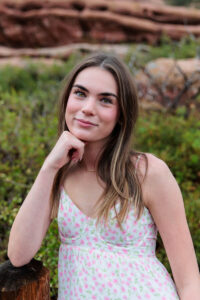Littleton high school senior photographer Red Rocks Amphitheatre Morrison Colorado rain teenage girl photography Mountain Vista Highlands Ranch South Valley park rock formations road sunset