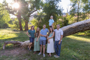 Littleton family and high school senior photographer Morrison park Colorado Dakota Ridge track cross country photography siblings married sunset golden light