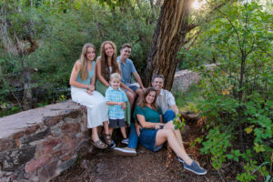 Littleton family and high school senior photographer Morrison park Colorado Dakota Ridge track cross country photography siblings married sunset golden light