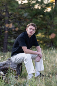 Littleton high school senior photographer sunrise photo session in Colorado Heritage ski cars swim team college bound sun Morrison photography Mt. Falcon park teenager