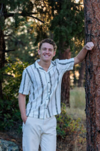 Littleton high school senior photographer sunrise photo session in Colorado Heritage ski cars swim team college bound sun Morrison photography Mt. Falcon park teenager