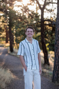 Littleton high school senior photographer sunrise photo session in Colorado Heritage ski cars swim team college bound sun Morrison photography Mt. Falcon park teenager