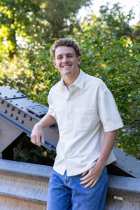 Littleton high school senior photographer sunrise photo session in Colorado Heritage ski cars swim team college bound sun Morrison photography Mt. Falcon park teenager urban