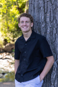 Littleton high school senior photographer sunrise photo session in Colorado Heritage ski cars swim team college bound sun Morrison photography Mt. Falcon park teenager